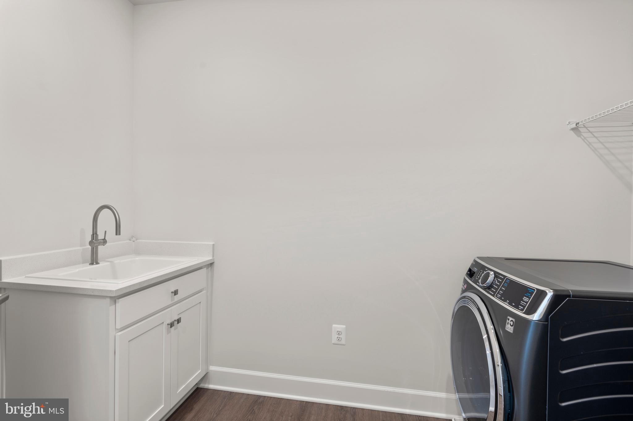1448 Lavender Cliff Way Odenton, MD 21113 - Photo 74 of 94 a bathroom with a sink and a mirror