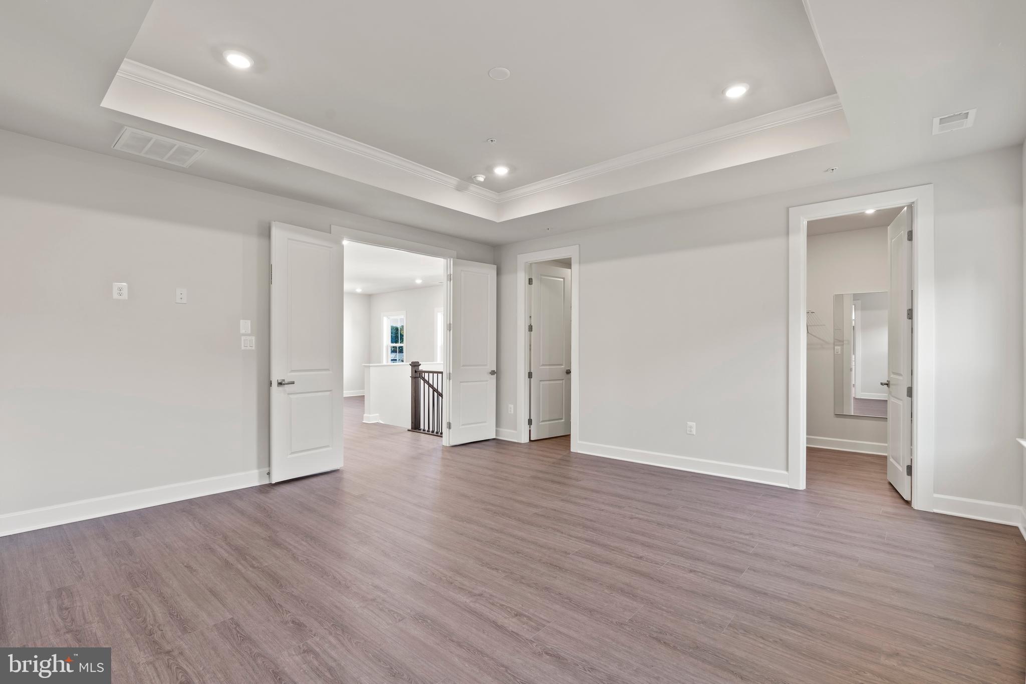 1448 Lavender Cliff Way Odenton, MD 21113 - Photo 79 of 94 a view of empty room with wooden floor
