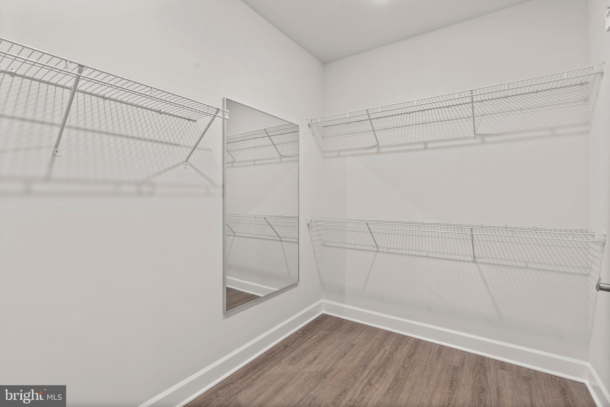 1448 Lavender Cliff Way Odenton, MD 21113 - Photo 81 of 94 a view of a room with racks on the wall