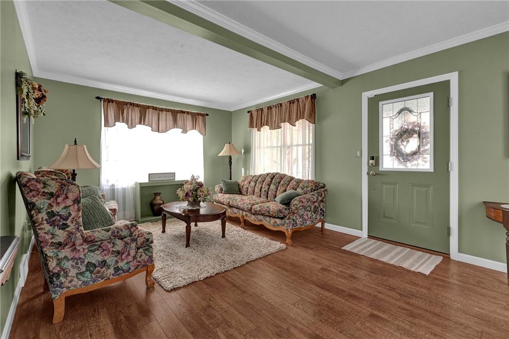 29 Community Springs Court Rochester, PA 15074 - Photo 4 of 21 a living room with furniture and a large window