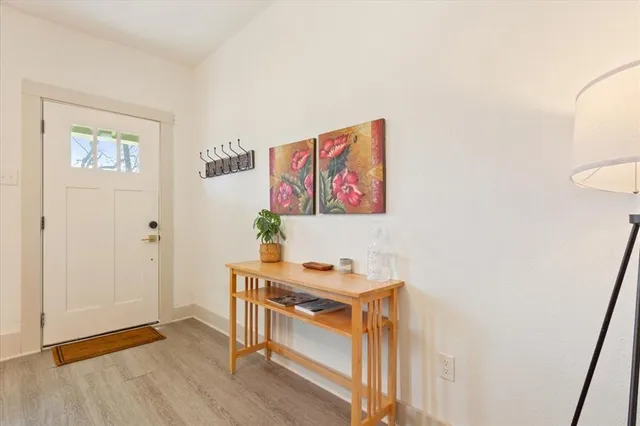 a workspace with furniture and wooden floor