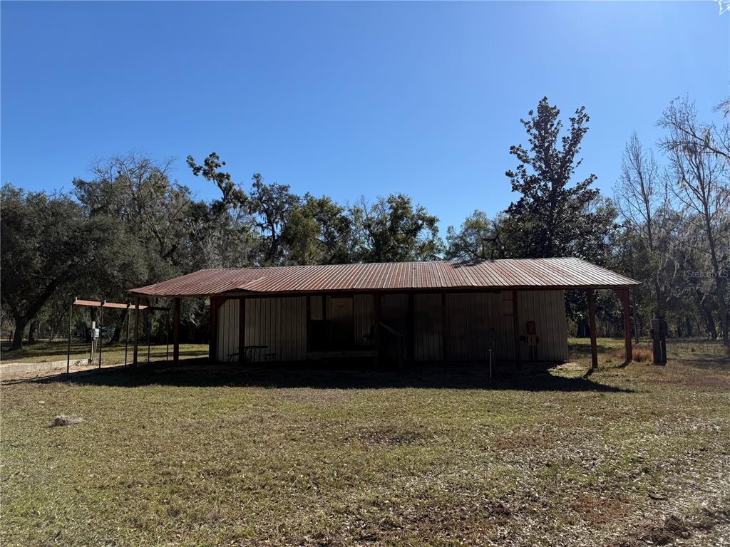 18630 Bradshaw Road Dade City, FL 33523 - Photo 5 of 43 a view of a house with a yard