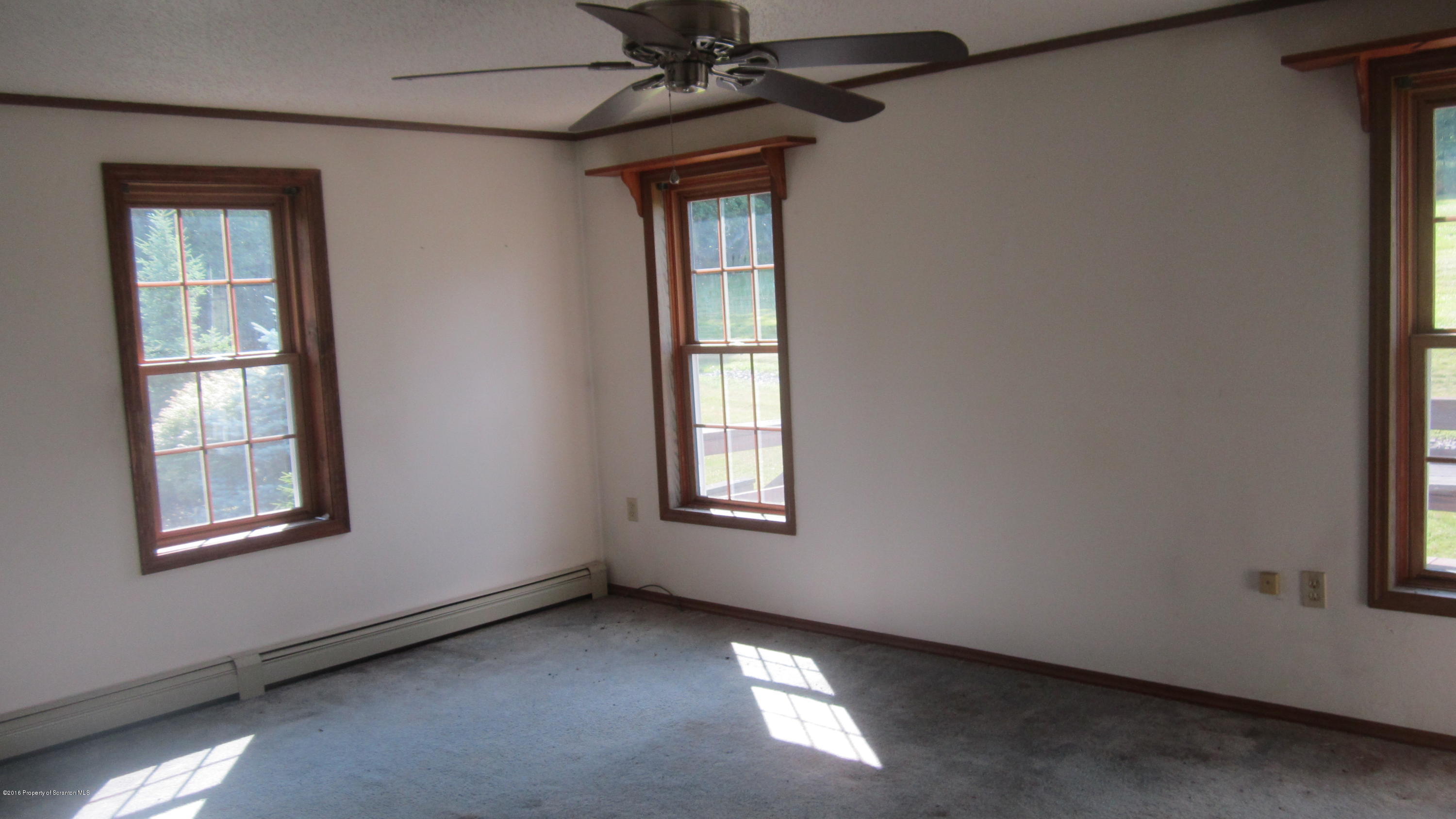 325 Rail Road Nicholson, PA 18446 - Photo 11 of 15 an empty room with a window