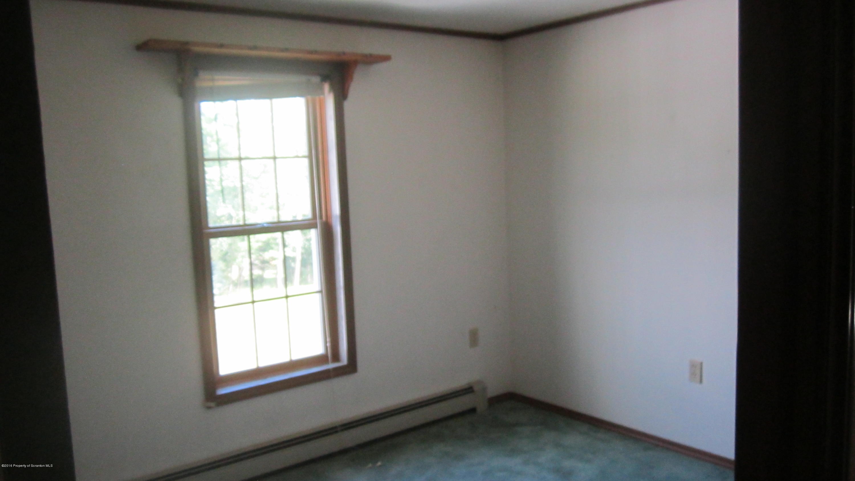 325 Rail Road Nicholson, PA 18446 - Photo 13 of 15 an empty room with a window