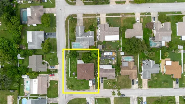 a living room with furniture and a piano