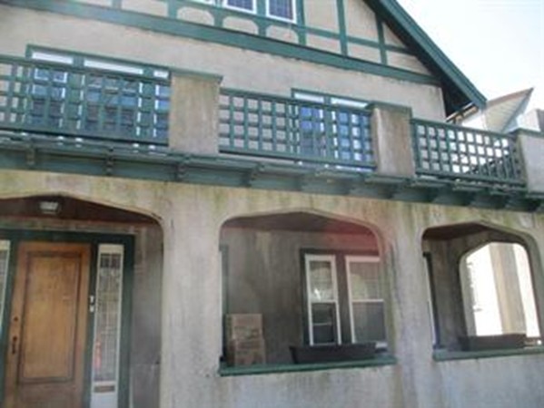 front view of a house with a lake view