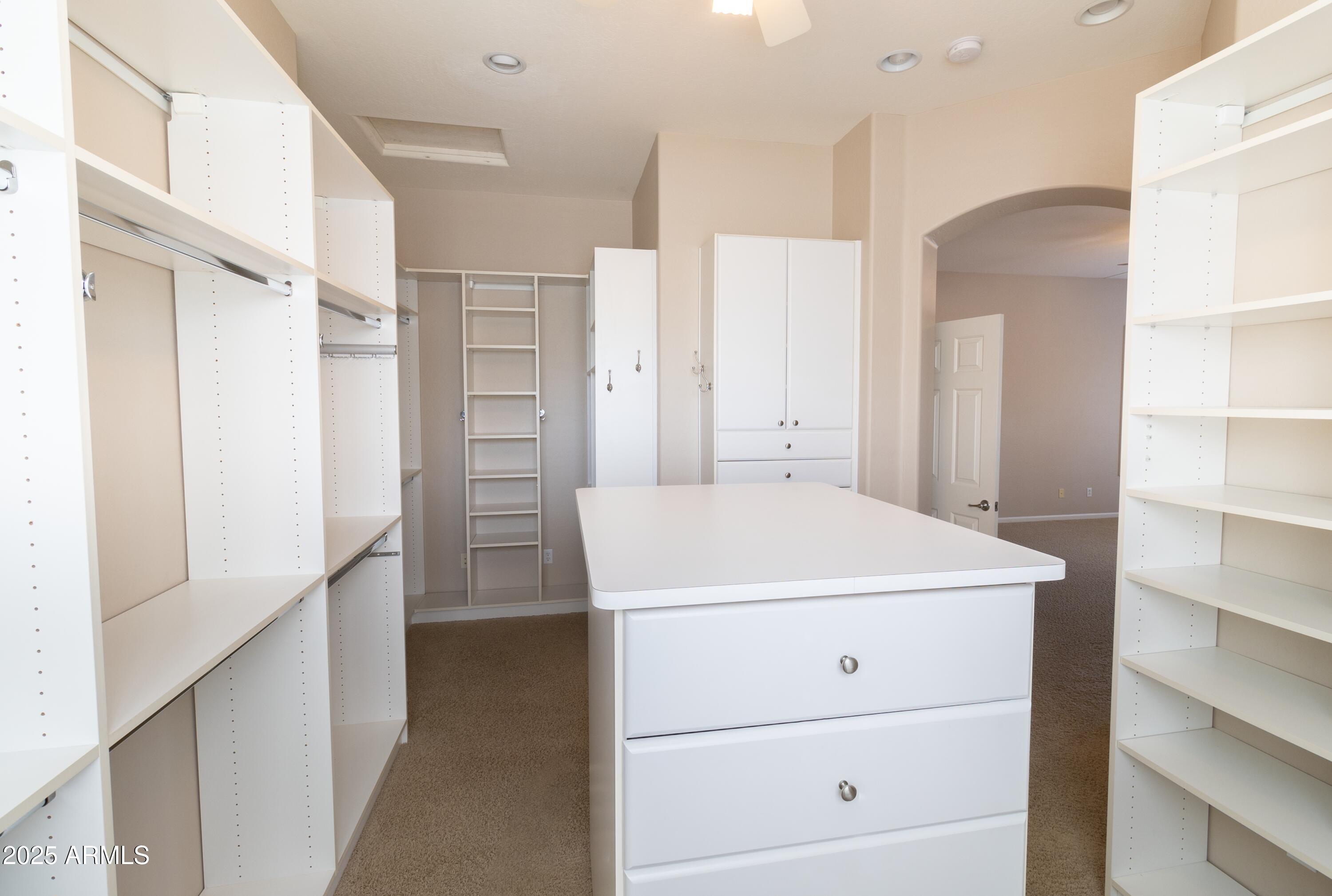 4241 East Andre Avenue Gilbert, AZ 85298 - Photo 19 of 39 a bathroom with a shower sink and mirror