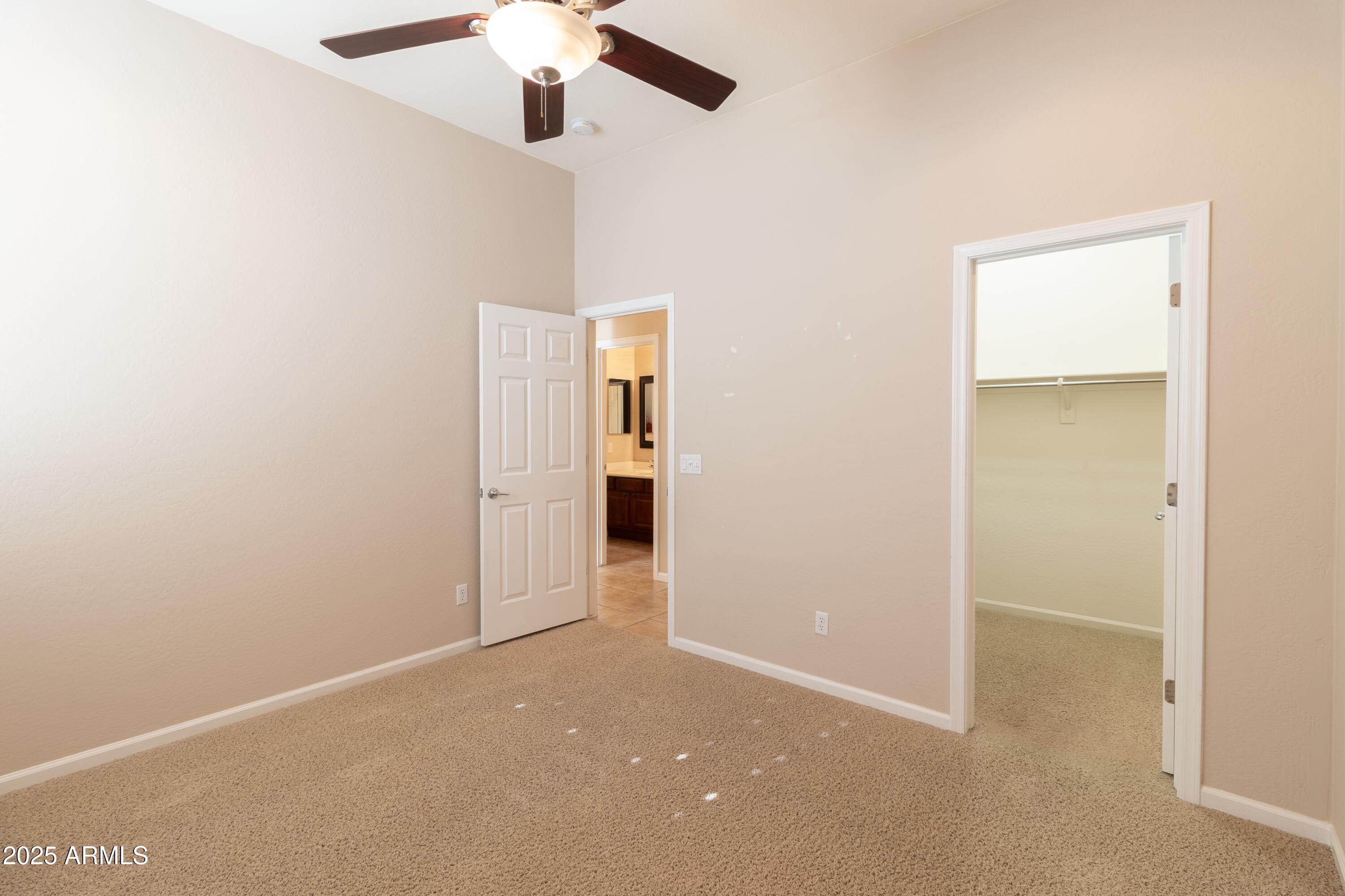 4241 East Andre Avenue Gilbert, AZ 85298 - Photo 22 of 39 an empty room with a bathroom