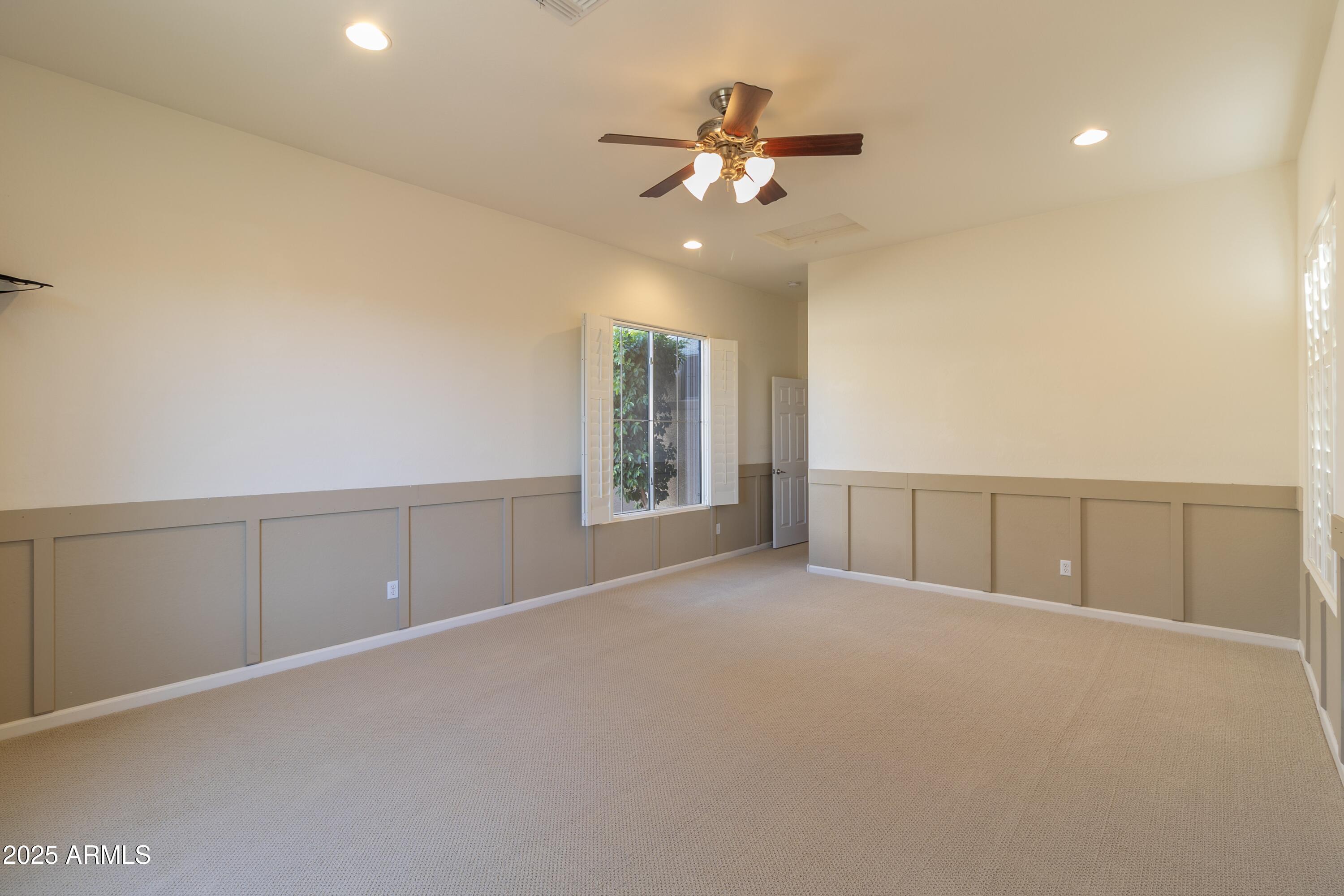 4241 East Andre Avenue Gilbert, AZ 85298 - Photo 27 of 39 a view of an empty room with a window