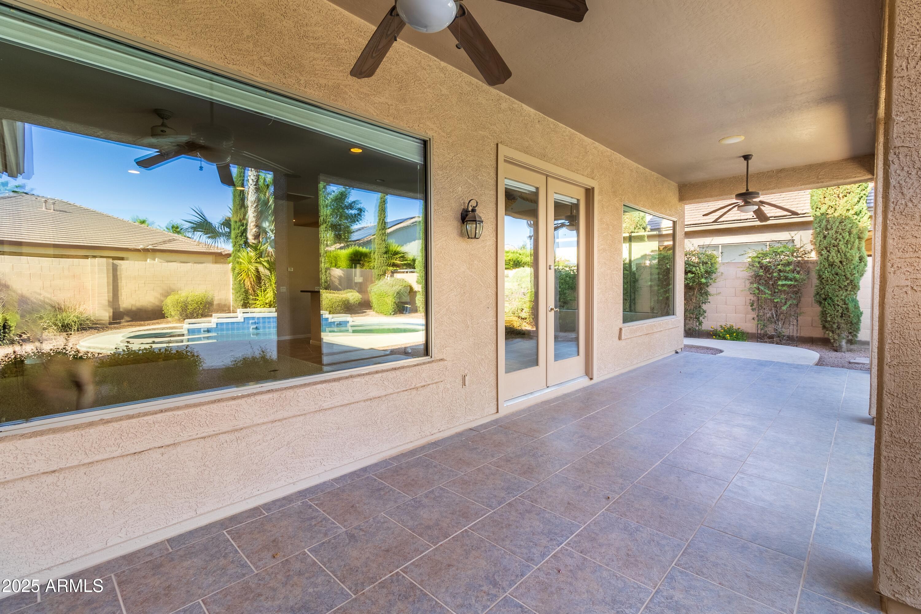 4241 East Andre Avenue Gilbert, AZ 85298 - Photo 33 of 39 a view of a building with porch and outdoor space
