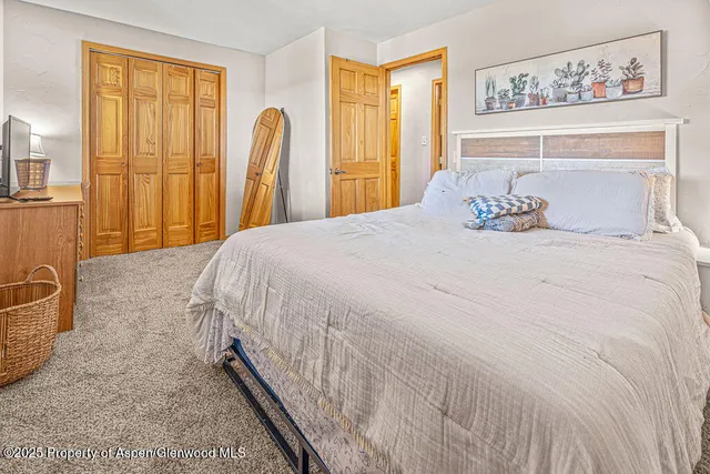 a spacious bathroom with a sink a toilet and shower