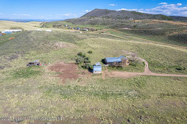 a view of a lake with a building in the background