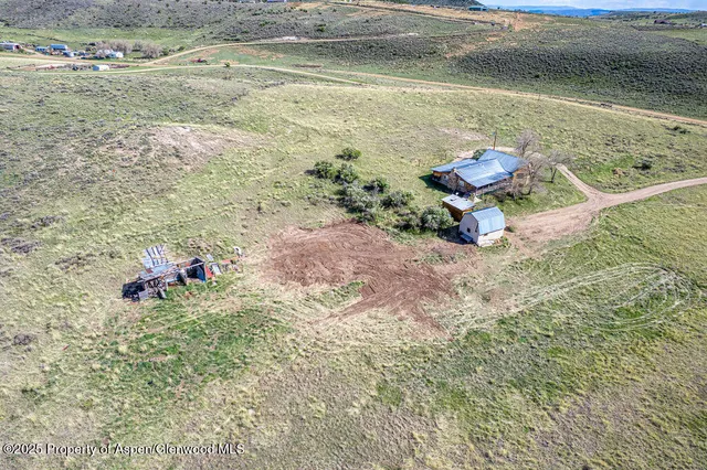 a view of a road with an ocean view
