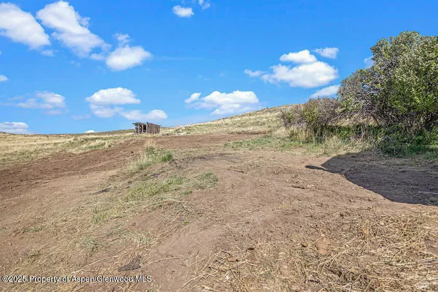 a view of an ocean and a mountain