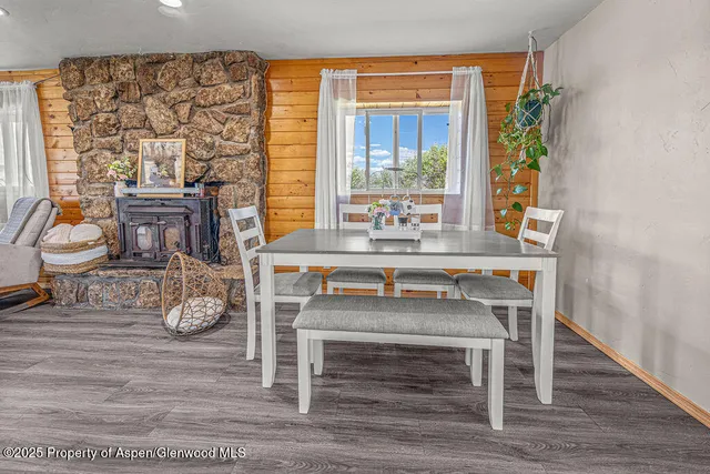 a kitchen with granite countertop cabinets and window