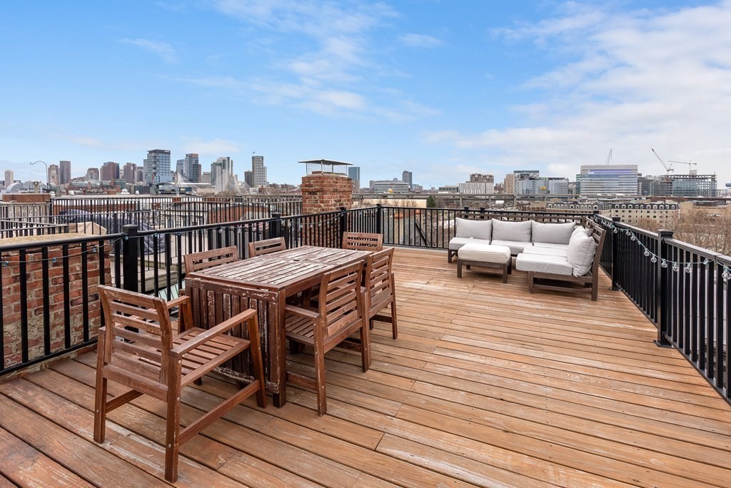 87 High Street, Unit 1 Boston, MA 02129 - Photo 11 of 18 a view of a roof deck with patio