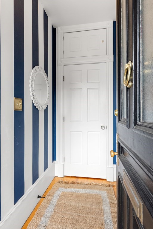 87 High Street, Unit 1 Boston, MA 02129 - Photo 16 of 18 a view of entryway with wooden floor