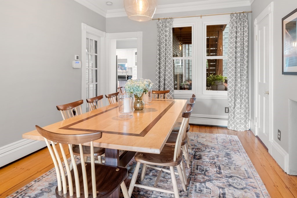 87 High Street, Unit 1 Boston, MA 02129 - Photo 5 of 18 a dining room with furniture and window