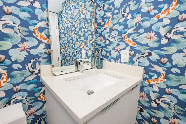 a close up of a sink with a utility and a sink