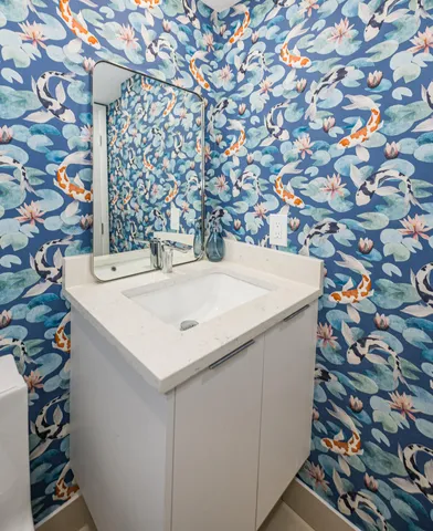 a utility room with a sink and washer