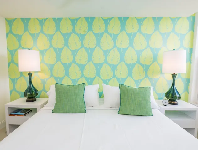 a living room with a lamp and a table