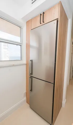 a view of a refrigerator in kitchen and a refrigerator