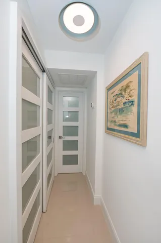 a view of closet area with empty racks