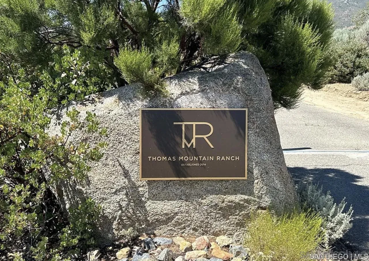 55001 Roadrunner Way, Unit 3 Anza, CA 92539 - Photo 8 of 11 a sign broad on the side of the road