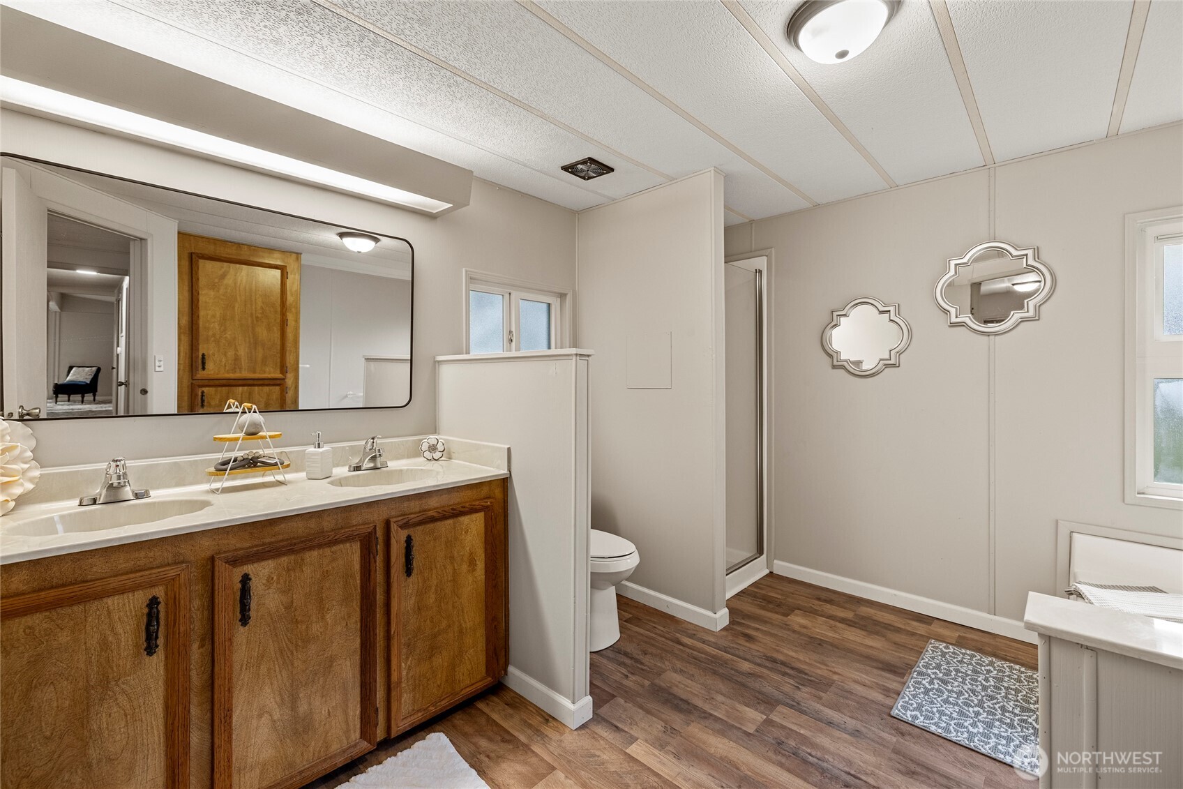 2725 East Fir Street, Unit 41 Mount Vernon, WA 98273 - Photo 19 of 38 a bathroom with a double vanity sink and a mirror