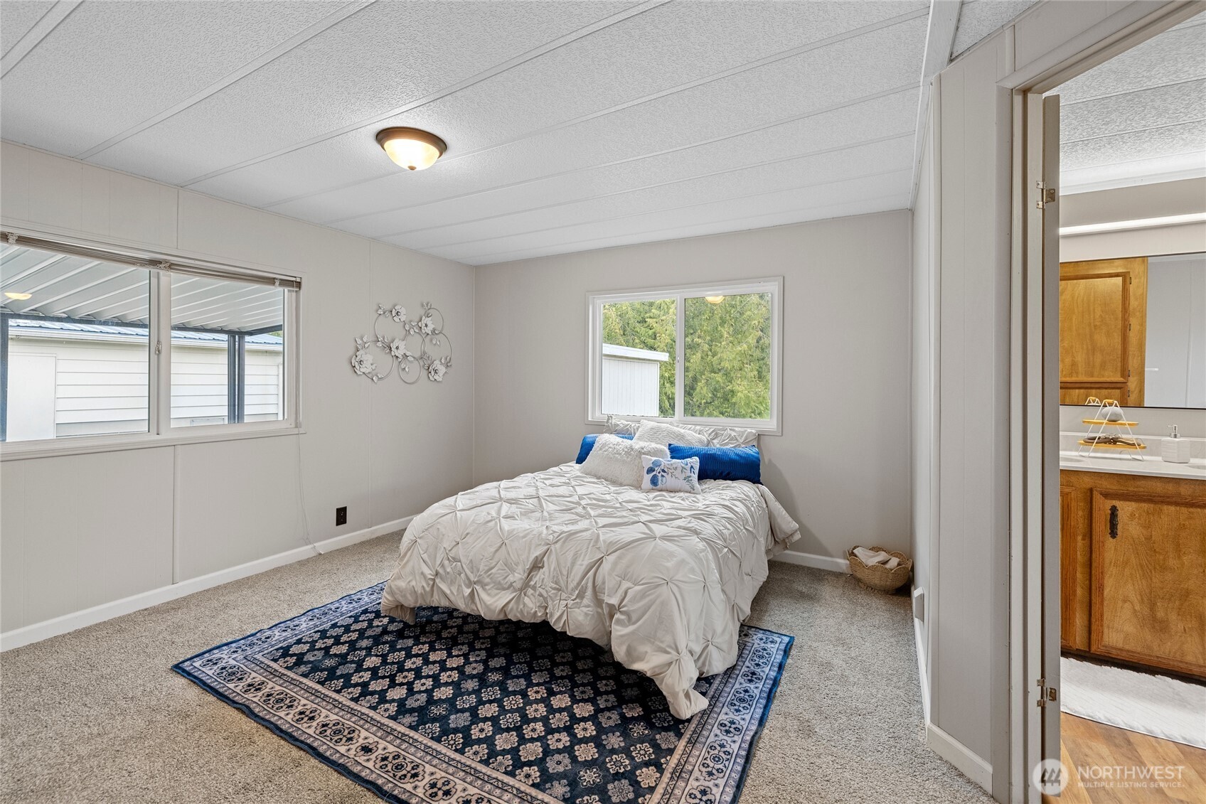 2725 East Fir Street, Unit 41 Mount Vernon, WA 98273 - Photo 22 of 38 a bedroom with a bed and a window