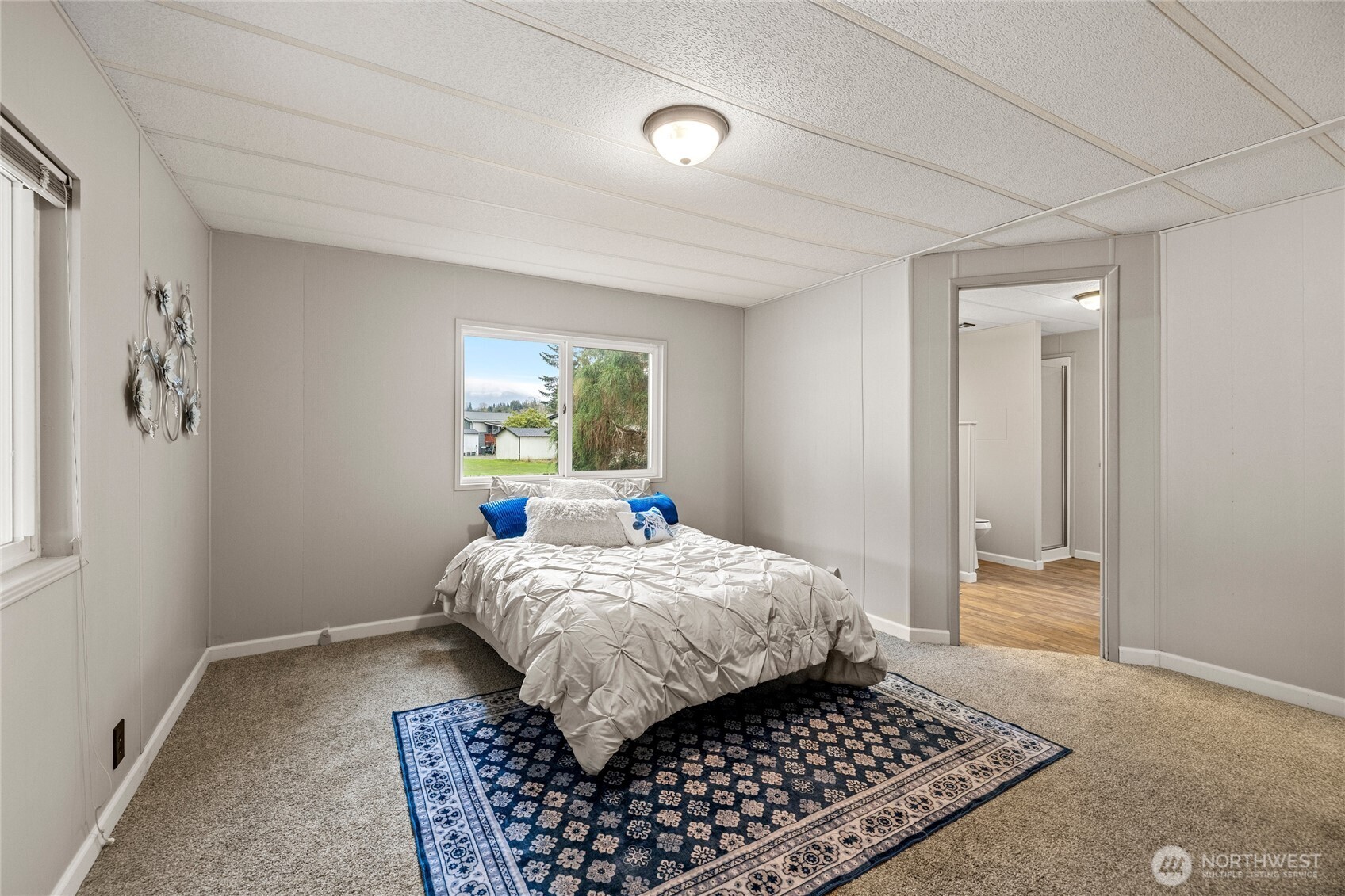 2725 East Fir Street, Unit 41 Mount Vernon, WA 98273 - Photo 24 of 38 a bedroom with a bed and a window