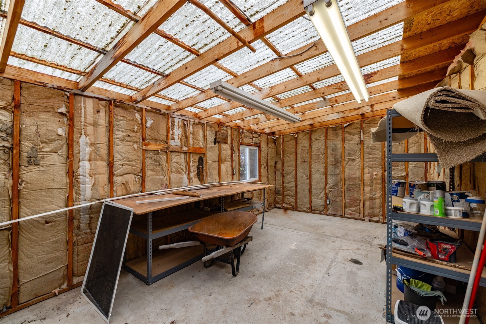 2725 East Fir Street, Unit 41 Mount Vernon, WA 98273 - Photo 25 of 38 a storage room with wooden floor and furniture