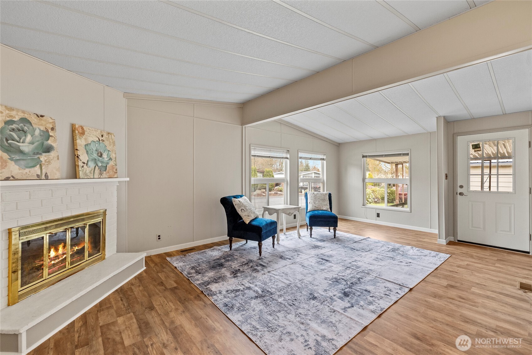 2725 East Fir Street, Unit 41 Mount Vernon, WA 98273 - Photo 8 of 38 a living room with furniture rug and window
