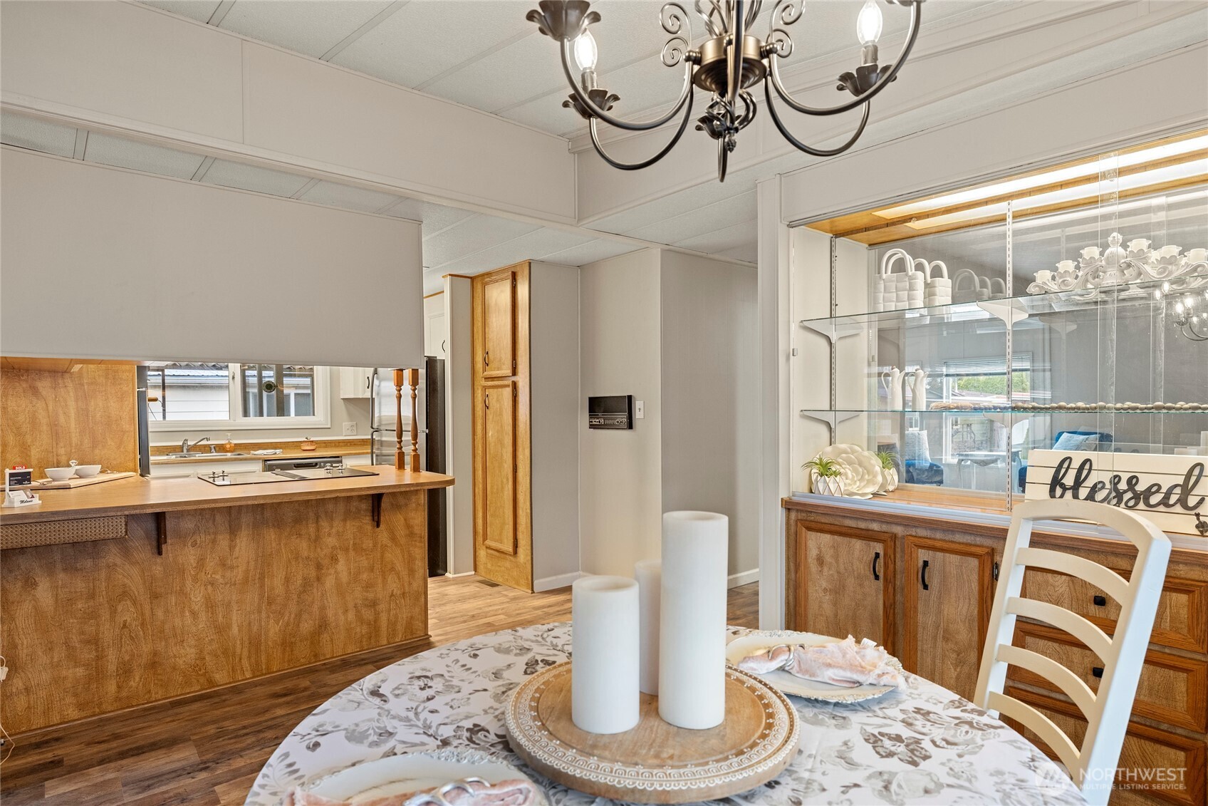 2725 East Fir Street, Unit 41 Mount Vernon, WA 98273 - Photo 10 of 38 a dining room with stainless steel appliances granite countertop a sink a table and chairs