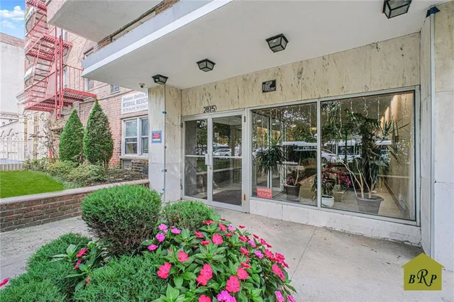 a front view of a house with a porch