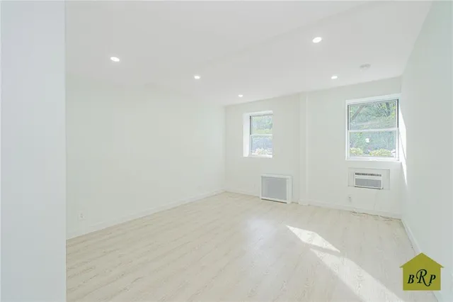 an empty room with windows