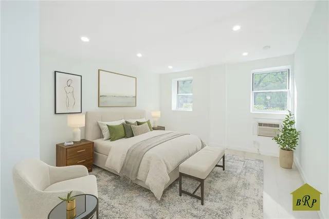 a bedroom with a bed and with furniture