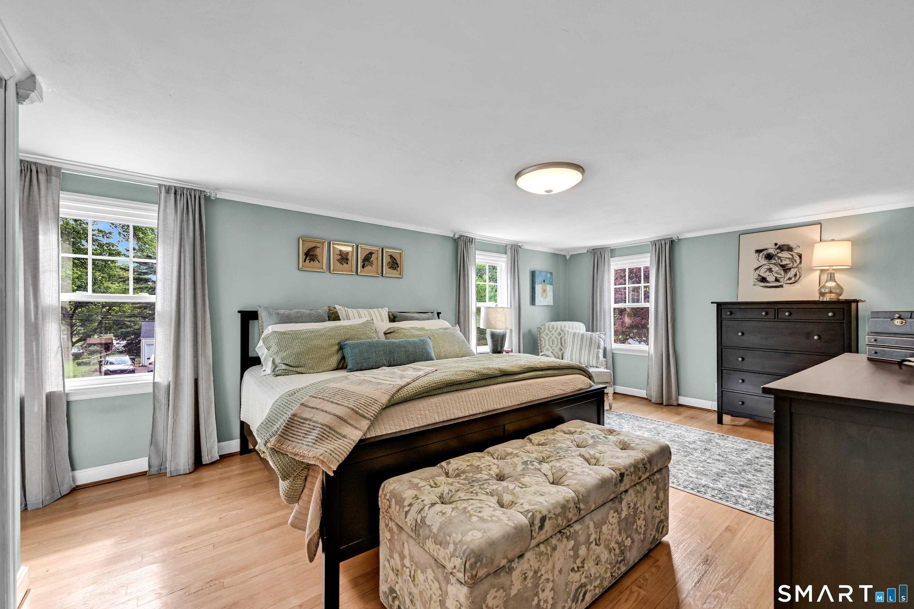 47 Spring Lane West Hartford, CT 06107 - Photo 29 of 38 a bedroom with a bed and a dresser