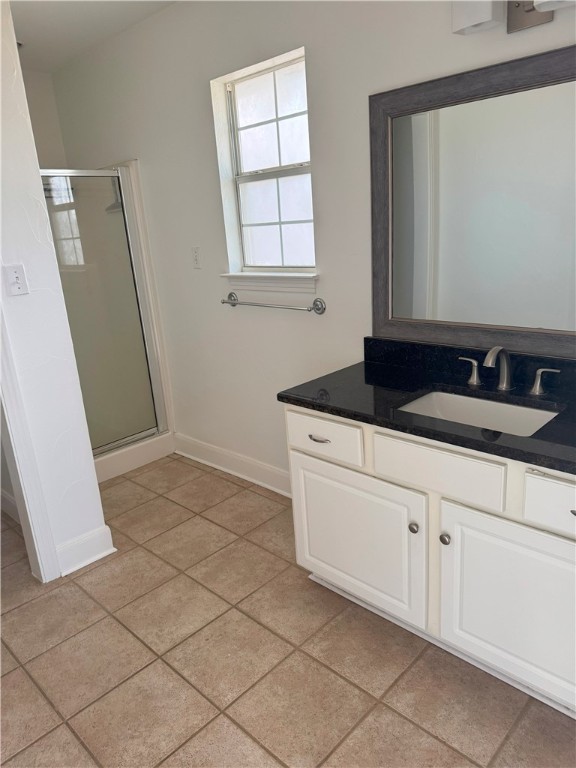 1132 Fifth Street Comfort, TX 78013 - Photo 18 of 20 a bathroom with a sink a vanity and a mirror