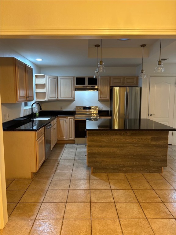 1132 Fifth Street Comfort, TX 78013 - Photo 8 of 20 a kitchen with stainless steel appliances granite countertop a sink and cabinets