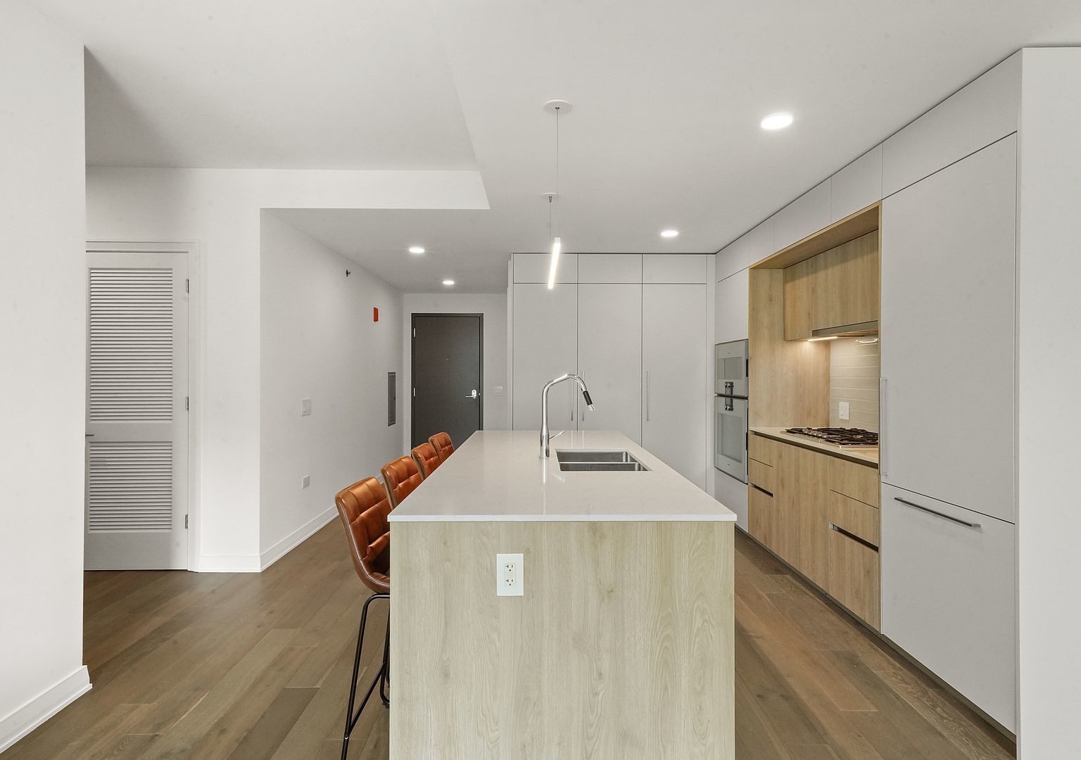 211 North Harbor Drive, Unit 2203 Chicago, IL 60601 - Photo 2 of 56 a kitchen with stainless steel appliances granite countertop a refrigerator a sink and a stove