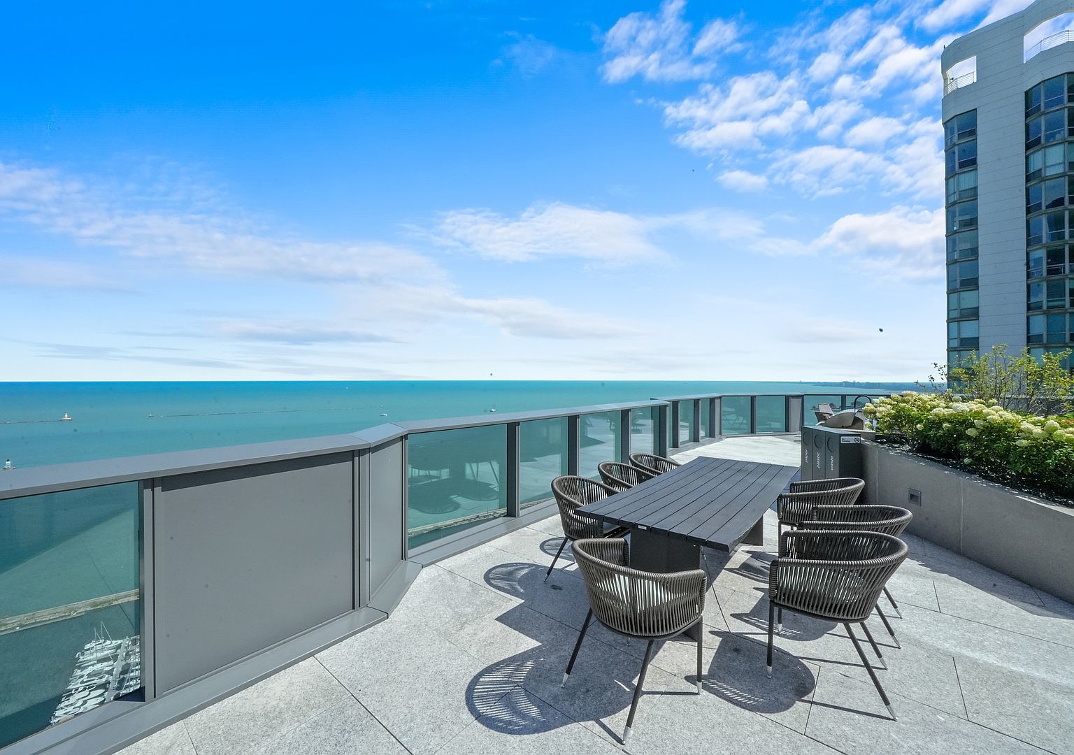 211 North Harbor Drive, Unit 2203 Chicago, IL 60601 - Photo 29 of 56 a view of a patio with furniture and table