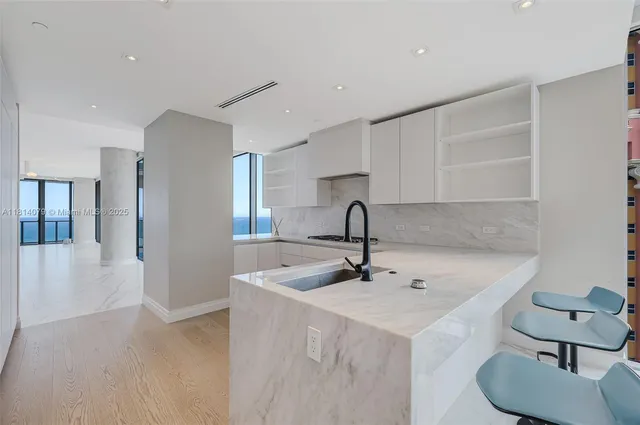 a view of livingroom with furniture and cabinet