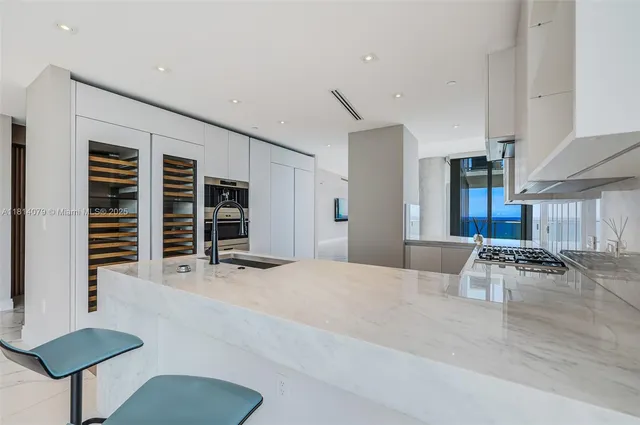 a bathroom with a tub and a sink