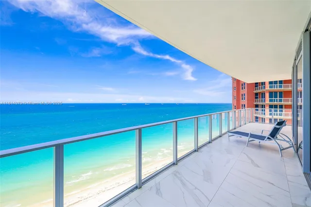 a balcony with chairs