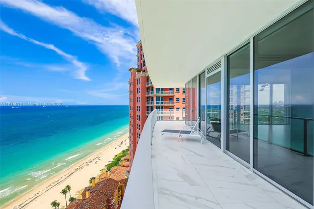 a view of balcony with furniture