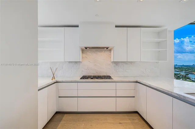 a kitchen with stainless steel appliances a cabinets and a sink