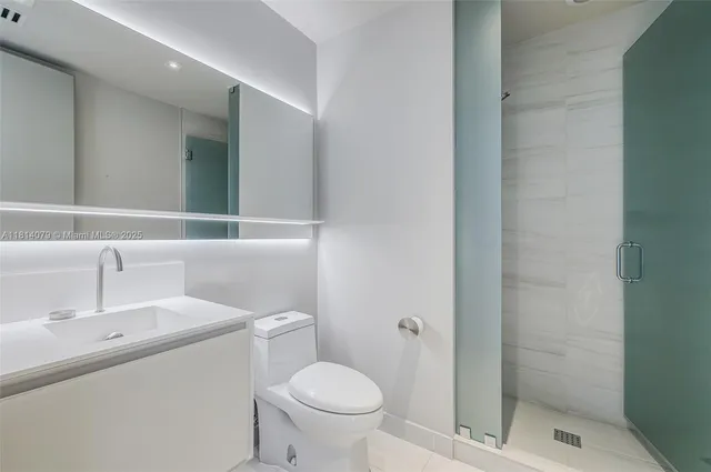 a view of an entryway with a floor to ceiling window