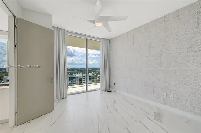 a view of a livingroom with a hallway