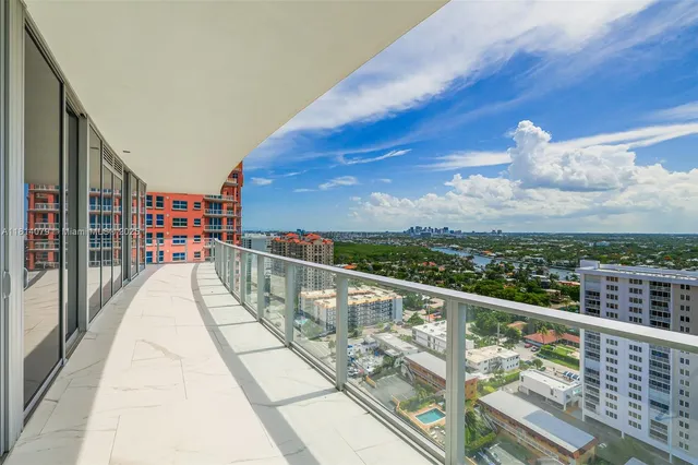 a view of a balcony with city view